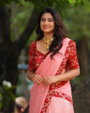 Actress Varshini Sounderajan in a Pink with Red Border Saree and Red Printed Blouse Photos 02