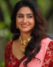 Actress Varshini Sounderajan in a Pink with Red Border Saree and Red Printed Blouse Photos 03