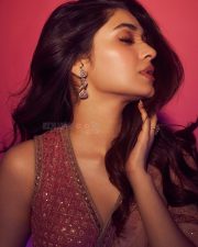 Alluring Actress Krithi Shetty in a Pink Sequined Saree With Deep V Blouse Photos 02