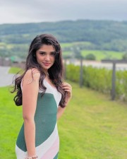 Beautiful Krithi Shetty in a Contrasting Knit Slit Cami Dress Photos 02