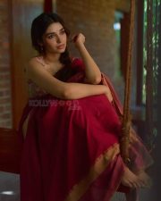 Beautiful Telugu Actress Krithi Shetty in a Maroon Red Silk Saree with a Cream Sleeveless Blouse Pictures 02 Beautiful Telugu Actress Krithi Shetty in a Maroon Red Silk Saree with a Cream Sleeveless Blouse Pictures 02