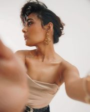 Bold and Sexy Shalini Pandey in a Pastel Pink Tube Top with a High Waisted Black Lace See Through Shorts Photos 02