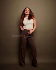 Bollywood Diva Kareena Kapoor Khan in a White Tank Top and Dark Brown High Waist Pants Photos 01