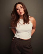 Bollywood Diva Kareena Kapoor Khan in a White Tank Top and Dark Brown High Waist Pants Photos 02