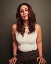 Bollywood Diva Kareena Kapoor Khan in a White Tank Top and Dark Brown High Waist Pants Photos 03
