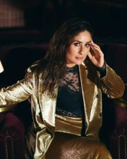 Bollywood Queen Kareena Kapoor in a Lace Top and Golden Blazer Photos 04