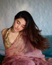 Breathtaking Actress Krithi Shetty in a Gold Mirror Work Lehenga Photos 03