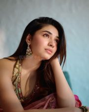 Breathtaking Actress Krithi Shetty in a Gold Mirror Work Lehenga Photos 04