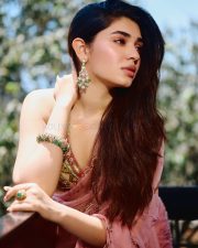 Breathtaking Actress Krithi Shetty in a Gold Mirror Work Lehenga Photos 05