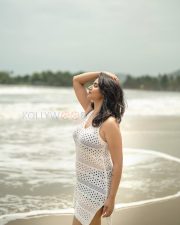 Breezy Actress Varshini Sounderajan in a White Crochet Mini Dress Photos 01