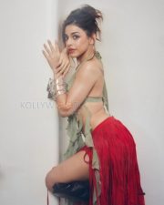 Captivating Actress Alaya F in a Mint Green Halter Crop Top and Red Fringe Skirt Photos 01