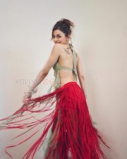 Captivating Actress Alaya F in a Mint Green Halter Crop Top and Red Fringe Skirt Photos 06