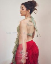 Captivating Actress Alaya F in a Mint Green Halter Crop Top and Red Fringe Skirt Photos 07