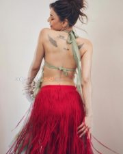 Captivating Actress Alaya F in a Mint Green Halter Crop Top and Red Fringe Skirt Photos 08