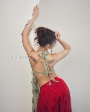 Captivating Actress Alaya F in a Mint Green Halter Crop Top and Red Fringe Skirt Photos 10