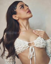 Captivating Actress Alaya F in a White Textured Crop Top and Mini Skirt Photos 02