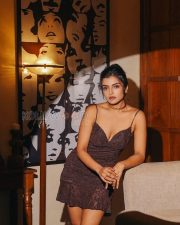 Captivating Actress Ashna Zaveri in a Dark Brown Lace Mini Dress Photos 03
