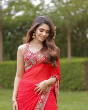 Cute Actress Krithi Shetty in a Vibrant Red Saree with Gold and Red Border Pictures 06