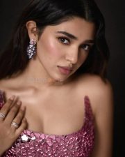 Dazzling Actress Krithi Shetty in a Pink Mirror Sequin Dress Photos 04