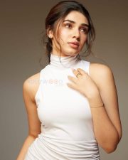 Dazzling Beauty Krithi Shetty in a White Bodycon Dress Photos 06