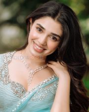 Elegant Actress Krithi Shetty in a Powder Blue Embellished Saree Photos 04