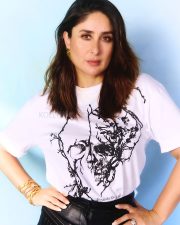 Elegant Bollywood Actress Kareena Kapoor Khan in a White Abstract Printed T Shirt with Black Striped Pants Photos 03