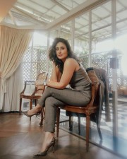 Elegant Kareena Kapoor in a Chic Brown Waistcoat and Pant Photos 02