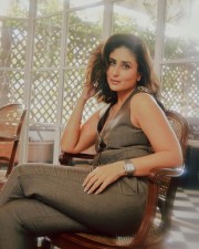 Elegant Kareena Kapoor in a Chic Brown Waistcoat and Pant Photos 04