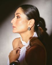 Elegant Kareena Kapoor in a White Halter Neckline Top with a Stylish Black Pant Photos 01