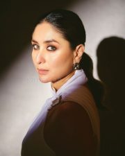 Elegant Kareena Kapoor in a White Halter Neckline Top with a Stylish Black Pant Photos 02