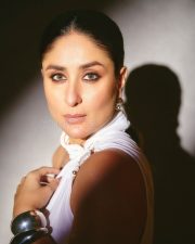 Elegant Kareena Kapoor in a White Halter Neckline Top with a Stylish Black Pant Photos 03