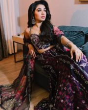 Elegant Krithi Shetty in a Purple Embroidered Lehenga with a Corset Style Top Photos 01