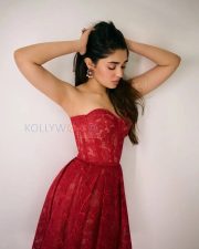 Enchanting Actress Krithi Shetty in a Red Lace Strapless Corset Midi Gown Photos 01