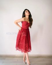 Enchanting Actress Krithi Shetty in a Red Lace Strapless Corset Midi Gown Photos 02