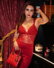 Femina Style Diva East Zaara Yesmin in a Red Deep V Neck Lace Top with a High Waisted Red Skirt Photos 01