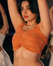 Genie Actress Krithi Shetty in a Orange Ruched Halter Crop Top Photos 02