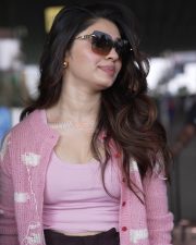Genie Heroine Krithi Shetty in a Pink Knitted Cropped Cardigan with a Light Pink Scoop Neck Tank Top and Dark Brown Wide Leg Pants Pictures 01