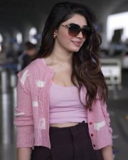 Genie Heroine Krithi Shetty in a Pink Knitted Cropped Cardigan with a Light Pink Scoop Neck Tank Top and Dark Brown Wide Leg Pants Pictures 03