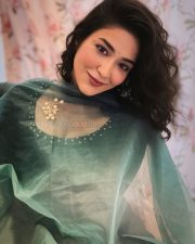 Glamorous Actress Priyanka Jawalkar in a Green Sheer Scarf with Embellished Neckline Photos 01
