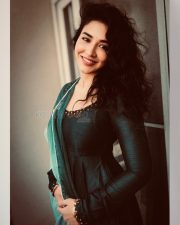 Glamorous Actress Priyanka Jawalkar in a Green Sheer Scarf with Embellished Neckline Photos 03