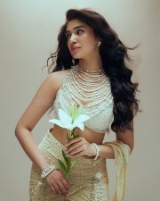 Gorgeous Tollywood Actress Krithi Shetty in an Pearl adorned Stylish Crop Top with a Designer Lehenga Photos 08