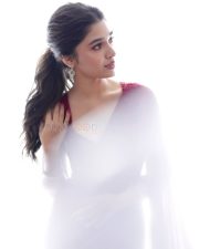 Love Insurance Kompany Heroine Krithi Shetty in a Red Saree with Sleeveless Blouse Photos 02