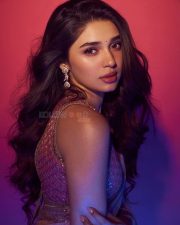 Love Insurance Kompany Heroine Krithi Shetty in a Rose Gold Saree with a Sleeveless Blouse Photos 06