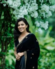 Malayalam Actress Anju Kurian in a Black Saree Photoshoot Stills 01