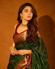 Manamey Heroine Krithi Shetty in a Green Traditional Kanchipuram Silk Saree with a Contrasting Maroon Sleeveless Blouse Pictures 03 Manamey Heroine Krithi Shetty in a Green Traditional Kanchipuram Silk Saree with a Contrasting Maroon Sleeveless Blouse Pictures 03