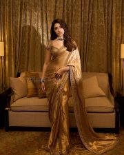 Mesmerizing Krithi Shetty in a Golden Saree with a Designer Saree Photos 07