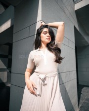 Radiant Beauty Krithi Shetty in a Cream Coloured Top with Matching Skirt and Pink Lipstick Photos 02