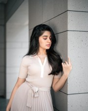 Radiant Beauty Krithi Shetty in a Cream Coloured Top with Matching Skirt and Pink Lipstick Photos 03