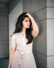 Radiant Beauty Krithi Shetty in a Cream Coloured Top with Matching Skirt and Pink Lipstick Photos 04