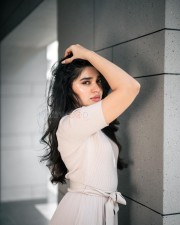 Radiant Beauty Krithi Shetty in a Cream Coloured Top with Matching Skirt and Pink Lipstick Photos 06